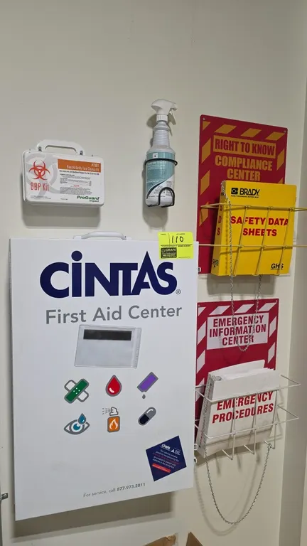 Cintas first aid cabinet with compliance centers. Includes wall-mount metal first aid cabinet stocked with assorted first aid supplies, ProGuard BBP c
