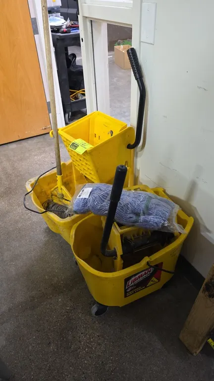 Libman Commercial poly mop buckets with wringers. Features yellow molded polyethylene construction, side-press wringers with handles, and wire bail ca