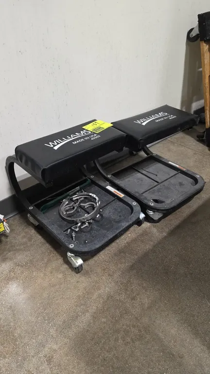Williams 42302 mechanics creeper seats. Features padded vinyl seat cushions, lower integrated tool and parts storage trays, and tubular frame construc