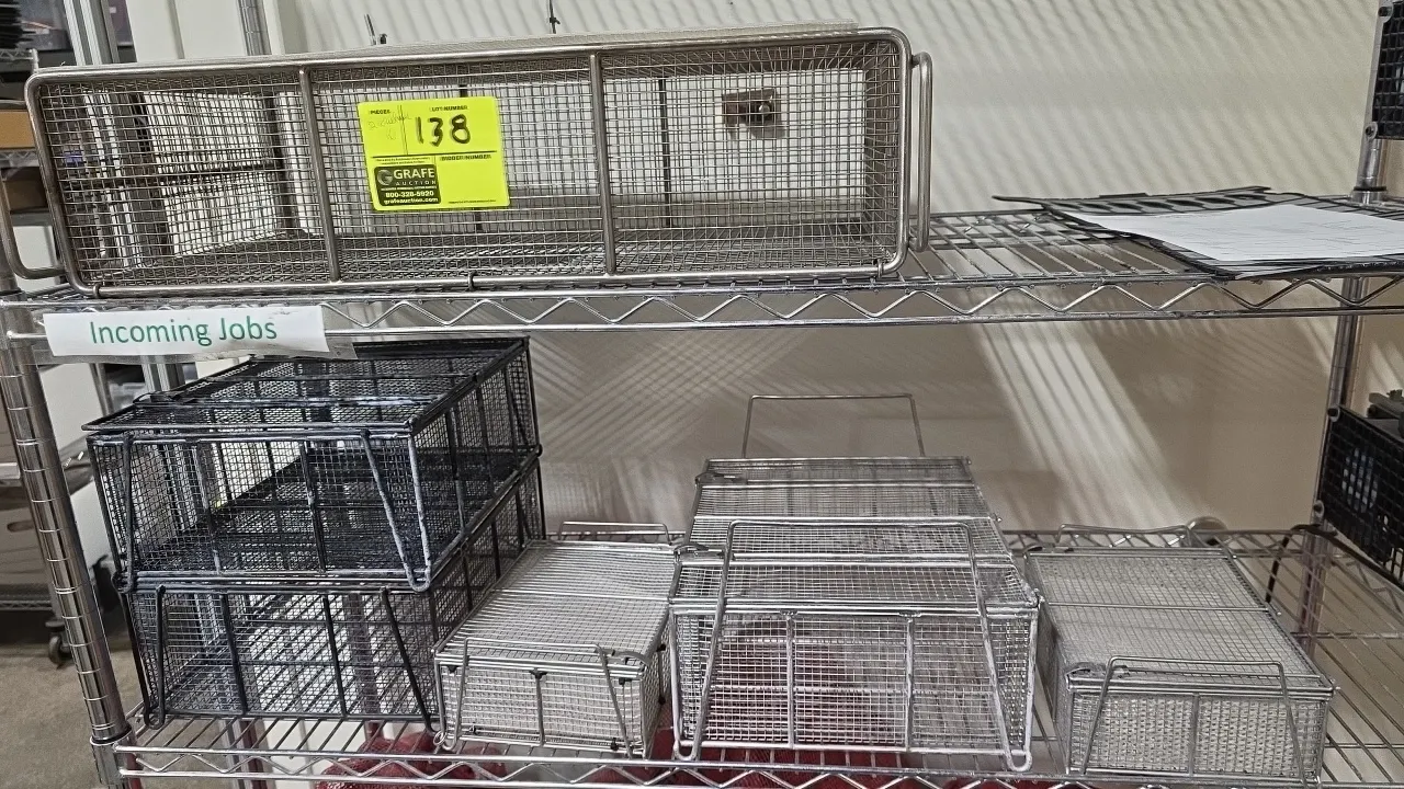 Assorted wire mesh baskets. Includes (6) baskets in various sizes and styles with wire handles and mesh construction. Wire shelving unit not included.