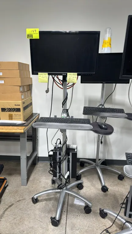 HP ProDesk 600 G3 MT computer workstation package. Includes 24" ASUS monitor, keyboard, mouse, and power strip. Mounted on an aluminum mobile workstat