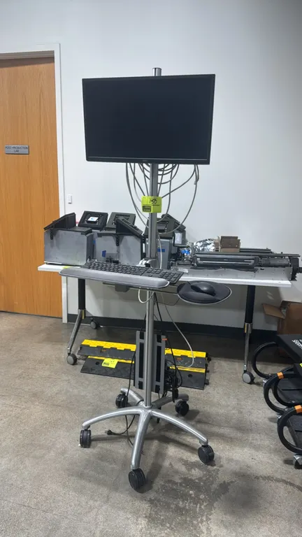 Dell OptiPlex 7090 Micro PC, Model D14U. Includes 24" Dell monitor, keyboard, and mouse. Electrical: 19.5V, 9.23A. Mounted on an aluminum portable wor