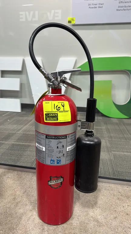 Buckeye 461 15 CD 15 lb CO2 fire extinguisher. Features carbon dioxide extinguishing agent, flexible discharge hose with applicator horn, and metal sq
