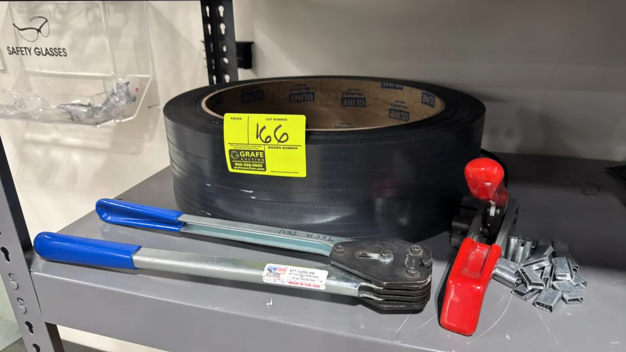 Manual strapping tool set. Includes Encore Packaging EP-1250-58 strapping sealer, manual strapping tensioner, roll of Uline poly strapping, and metal