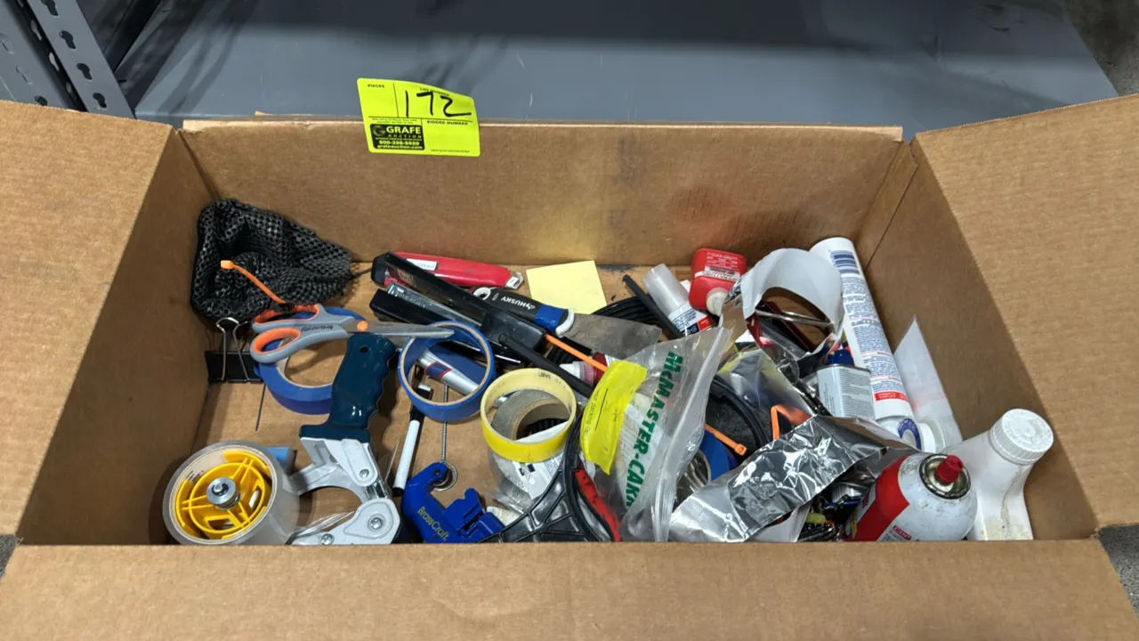 Package lot of assorted tools and shop supplies. Includes packing tape gun, BrassCraft pipe cutter, Husky putty knife, utility knife, scissors, assort