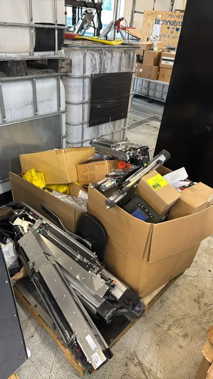 Package lot of various 3D printer components. Includes motorized linear slide assemblies, igus cable carriers, boxed hardware, and miscellaneous servi