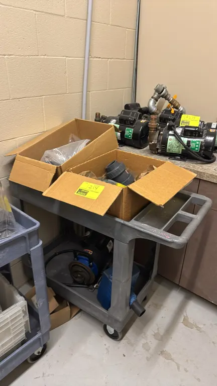 Poly 2-tier utility cart. Features integrated push handle. 30" x 18". Mounted on casters. Includes AMT 2761-95 pump, two boxes of assorted plastic pip