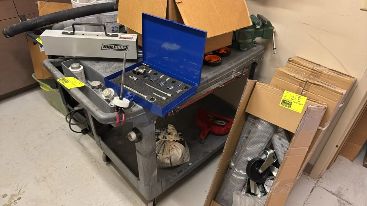 Poly 2-tier utility cart. 3' x 2'. Mounted on casters. Includes various tools and contents, Masterforce bench vise, Williams ratchet and socket set in