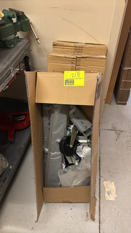 Uline H-6887 packing table caster kits. Features 5" x 1-1/4" swivel casters with brakes, table leg inserts, and hardware. Capacity: 450 lbs. 6 per car