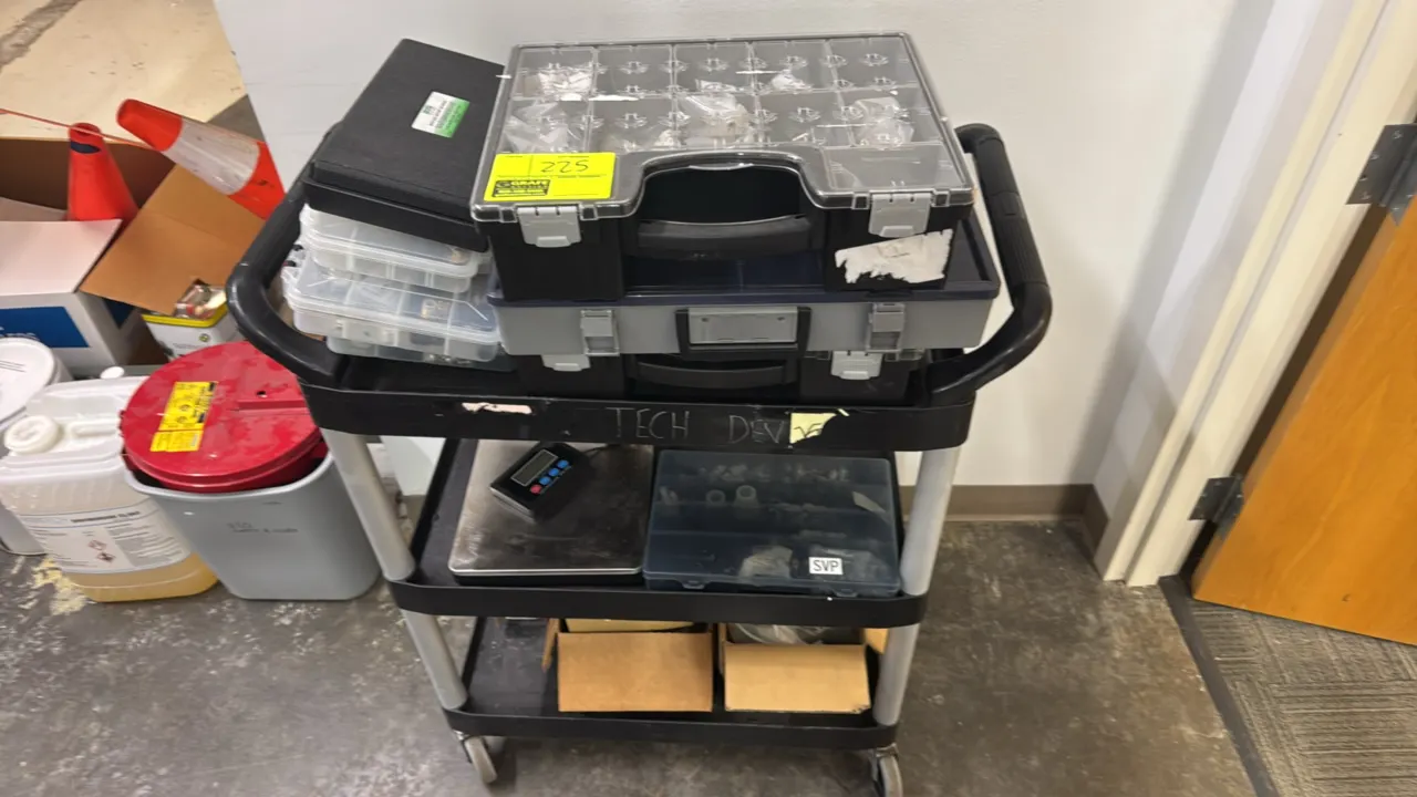 Poly 3-tier utility cart with contents. Includes Marson 39301 rivet nut setter kit, Fuzion digital shipping scale, plastic organizer cases with assort