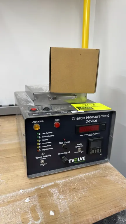 Evolve Additive Solutions charge measurement device. Features digital LED display, Omron H5CX digital timer, agitation and bias controls, toner polari