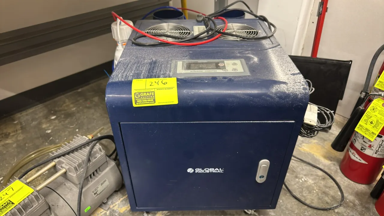 2021 Global Industrial 246139 portable ultrasonic humidifier. Features digital display control panel, external water filtration assembly, and dual ven