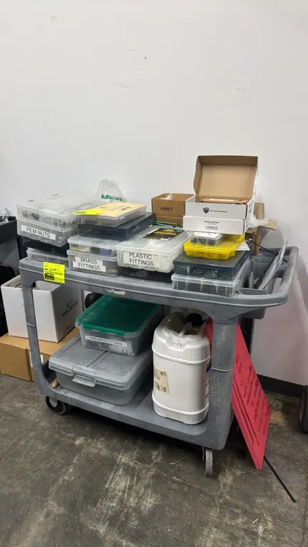 Poly 2-tier utility cart. Features dual lipped shelves and integrated push handle. 3' x 2'. Mounted on casters. Contents not included.