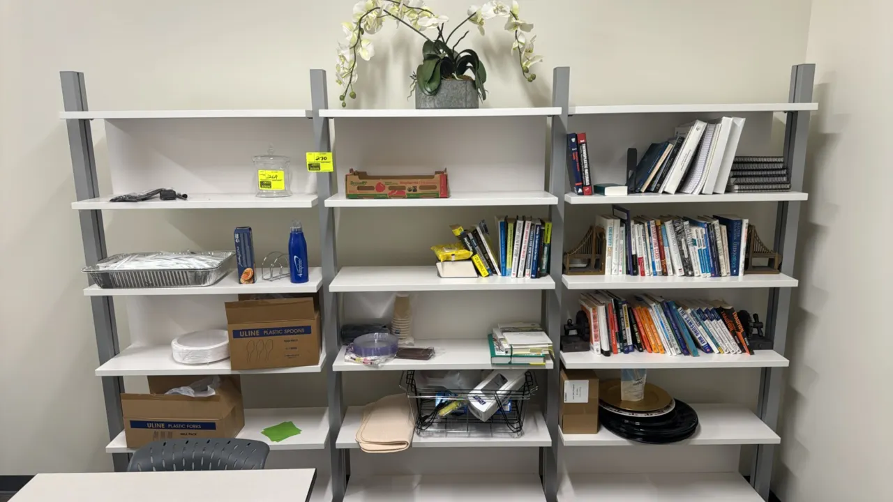 Package lot of assorted items. Includes artificial potted orchid plant, books with decorative bookends, catering and breakroom supplies including disp