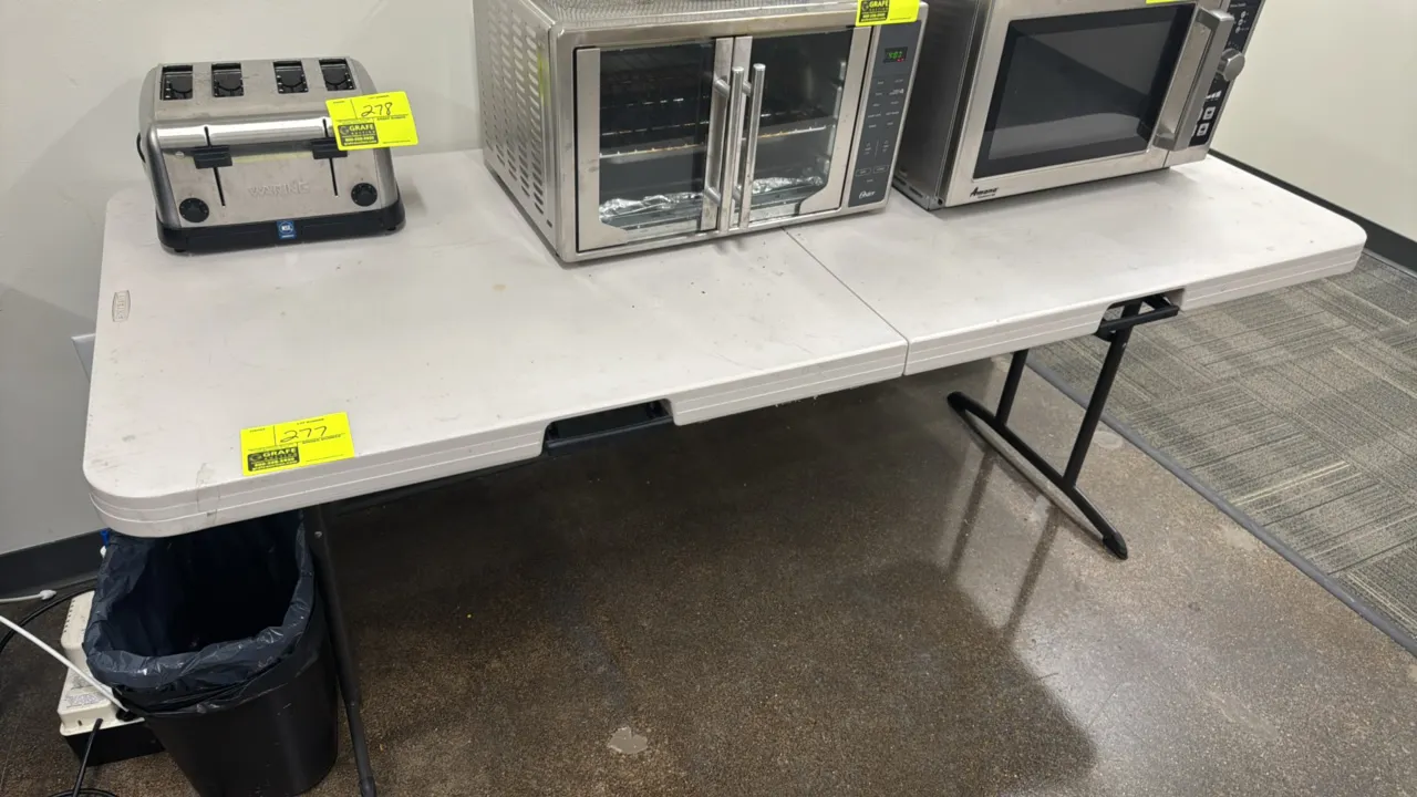 Lifetime polyethylene folding table. Features fold-in-half design, integrated carry handle and folding metal legs. 72" x 30". Contents not included.