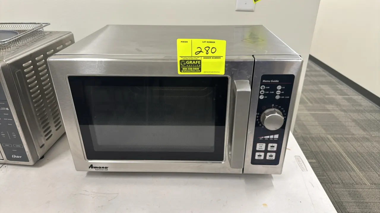 2014 Amana RCS10DSE commercial microwave oven. Features stainless steel construction, 10-minute dial timer control, and side-hinged door with grab han