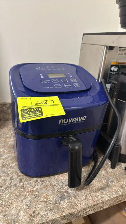 Nuwave electric countertop air fryer. Features blue housing, digital control panel with LCD display, preset cooking functions, wattage selection, and