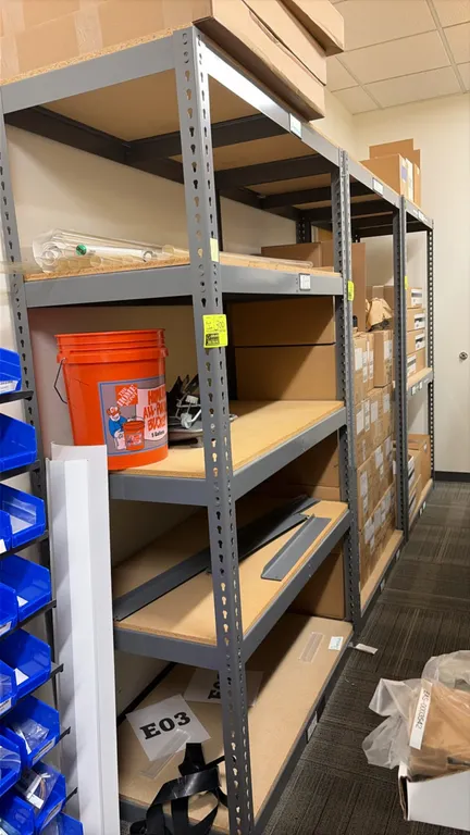 Light-duty boltless steel shelving unit. Features particle board decking. 48" x 24" x 84". Includes contents: painting supplies, 5-gallon bucket, pain