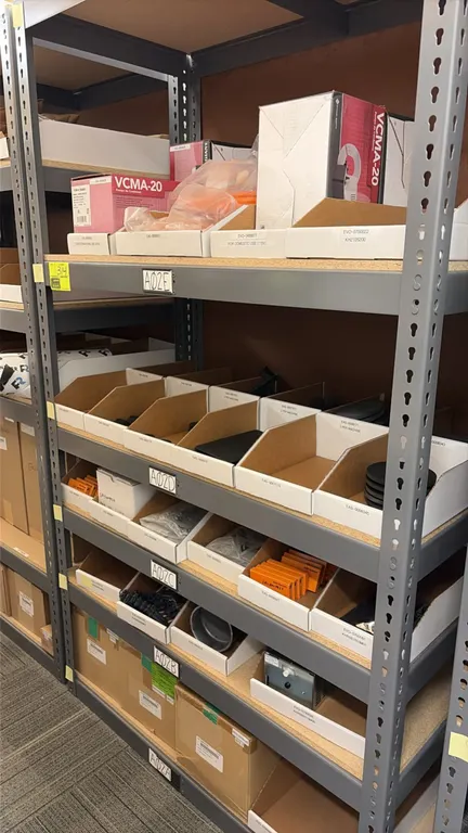 Light-duty storage racking unit. Features gray steel upright frame construction with particle board shelving. 48"W x 24"D x 84"H. Contents not include