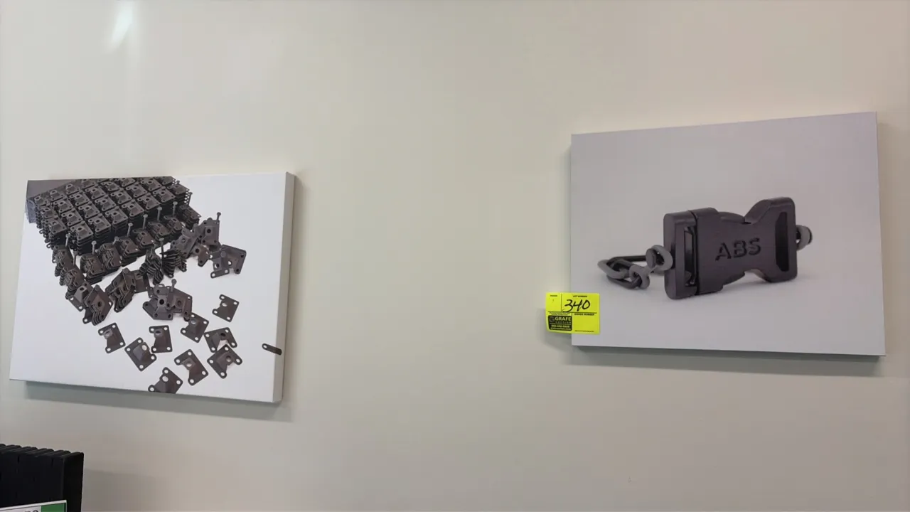 Canvas photo prints of parts. Features gallery-wrapped canvas construction depicting photographs of manufactured components and 3D-printed parts. Wall