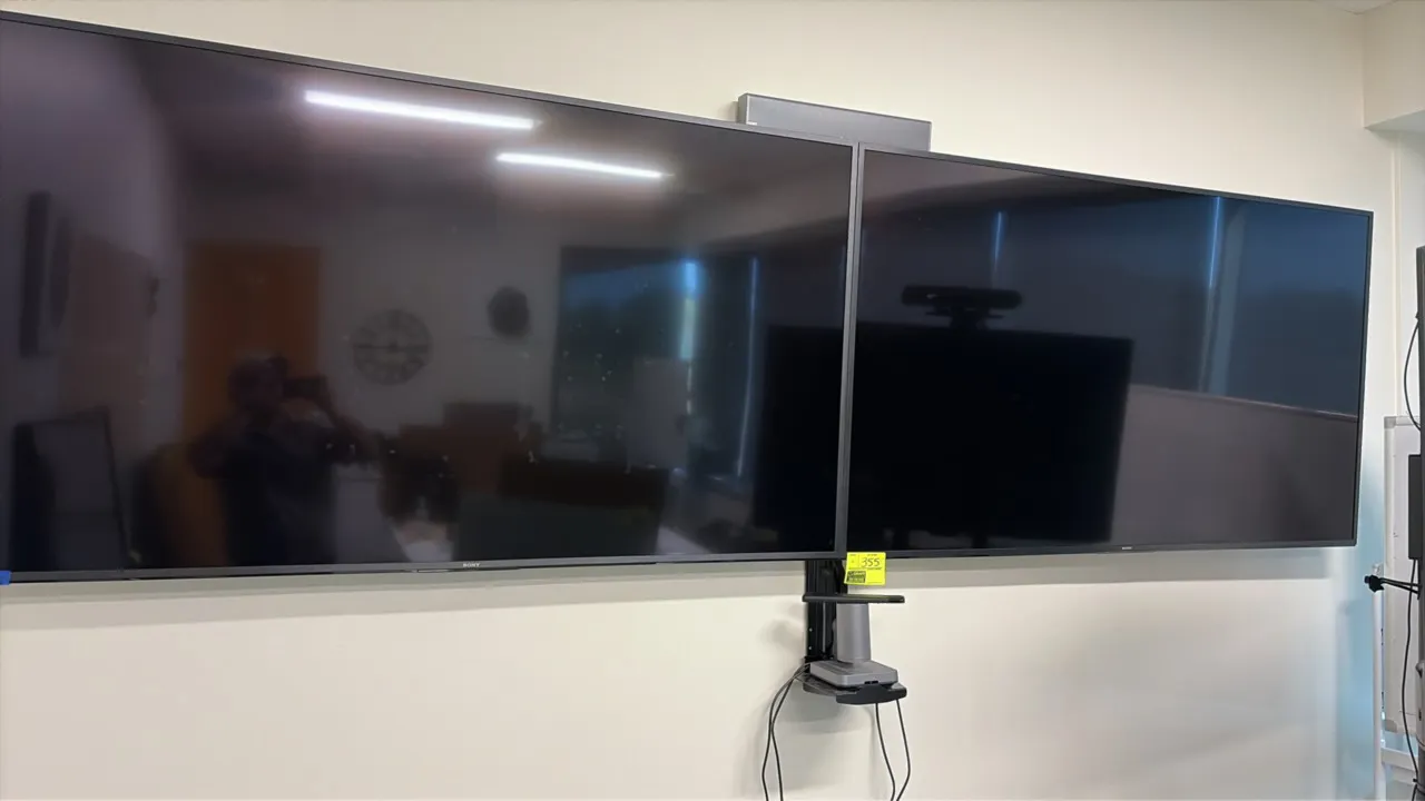 Sony 75" flat screen TVs with Yealink video conferencing system. Package includes (2) 75" Sony flat screen displays, wall mounting brackets, and Yeali