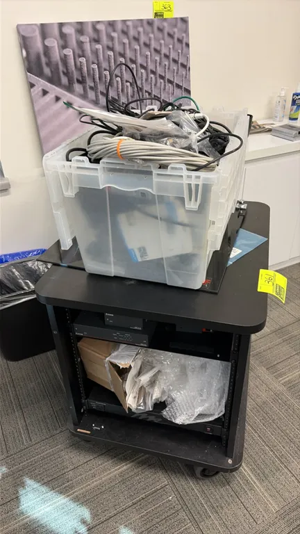 Mobile AV equipment rack cabinet with components. Includes Extron HDMI DA4 distribution amplifier, Extron DMP 44 LC digital matrix processor, Crestron