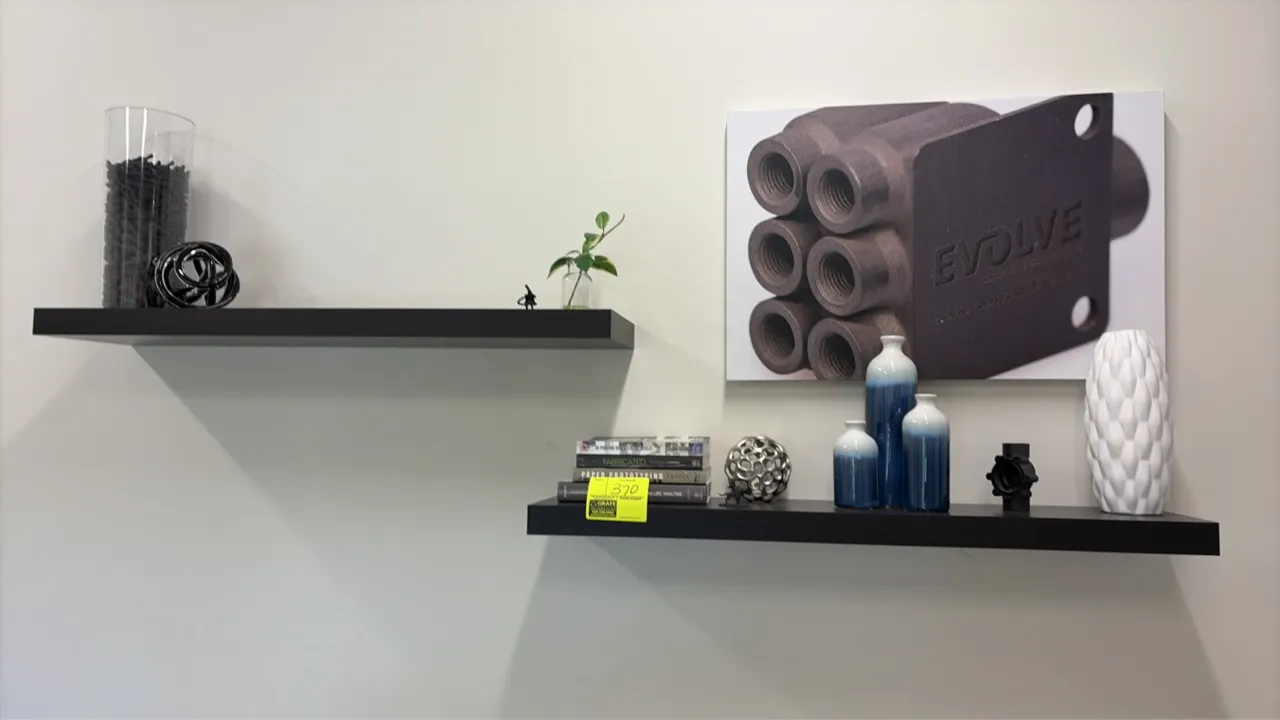 Package lot of wood floating wall shelves with assorted decor and canvas photos. Includes 3'L black finish floating wall shelves, assorted decorative