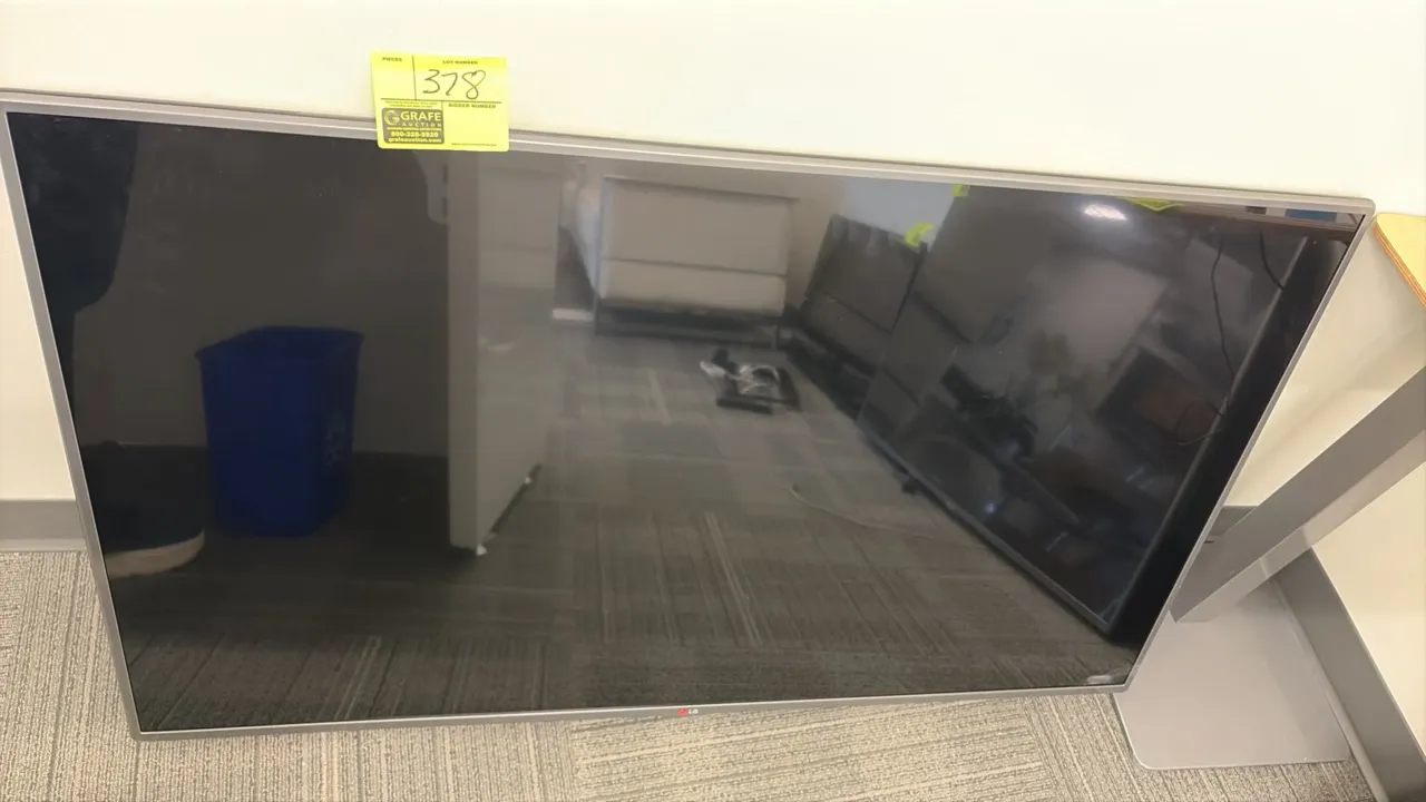2014 LG 55LY540S-UA 55" flat screen LED TV. Features slim silver-tone bezel and attached rear mounting brackets. S/N: 406RMPG0J432. Electrical: 100-24