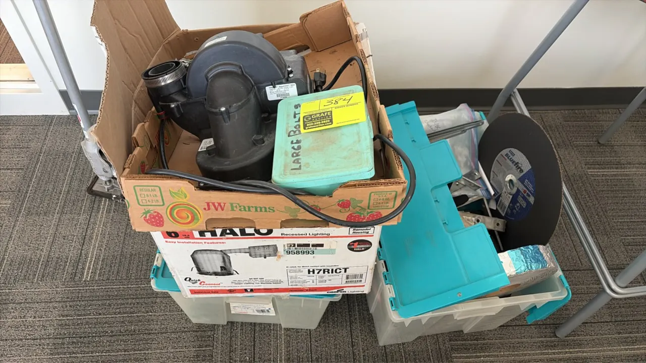 Assorted blower assembly, tools, and hardware. Includes electric draft inducer blower assembly with power cord, Norton BlueFire abrasive disc, tape ro