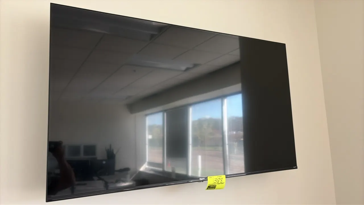 Hisense 58" flat screen television. Includes wall mounting bracket.