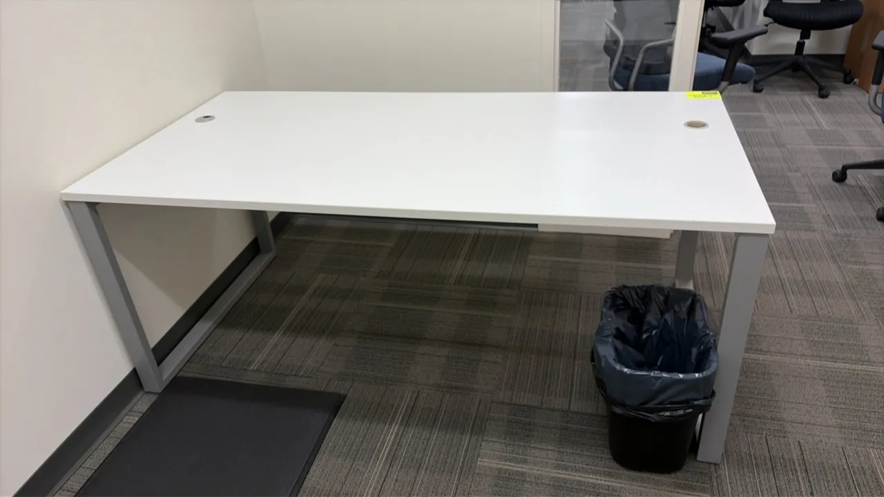 Laminate office workstation suite. Includes 72" x 36" desk, credenza with overhead frosted glass door hutch, 2-drawer lateral file cabinet, 2-drawer m