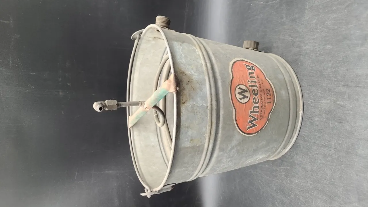 VINTAGE WHEELING METAL BUCKET