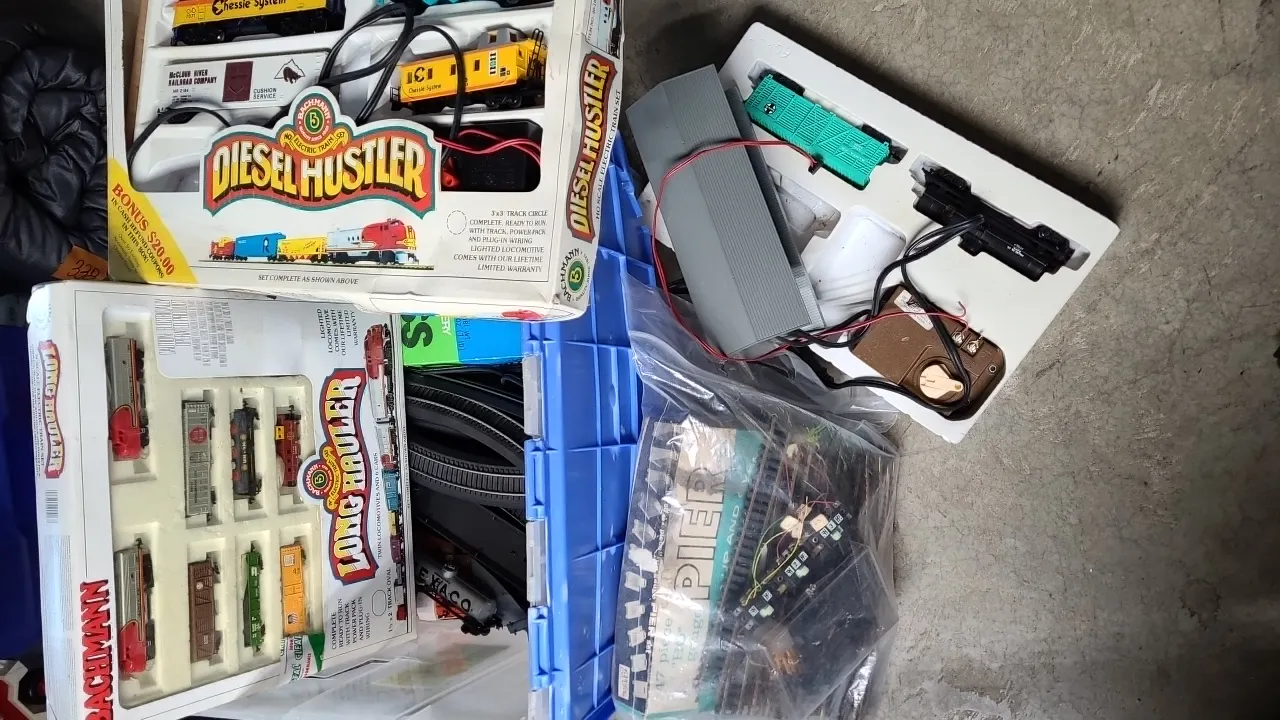TRAINS- DIESEL HUSTLER, LONG HAULER, TRACK, and more in tote (cracked)