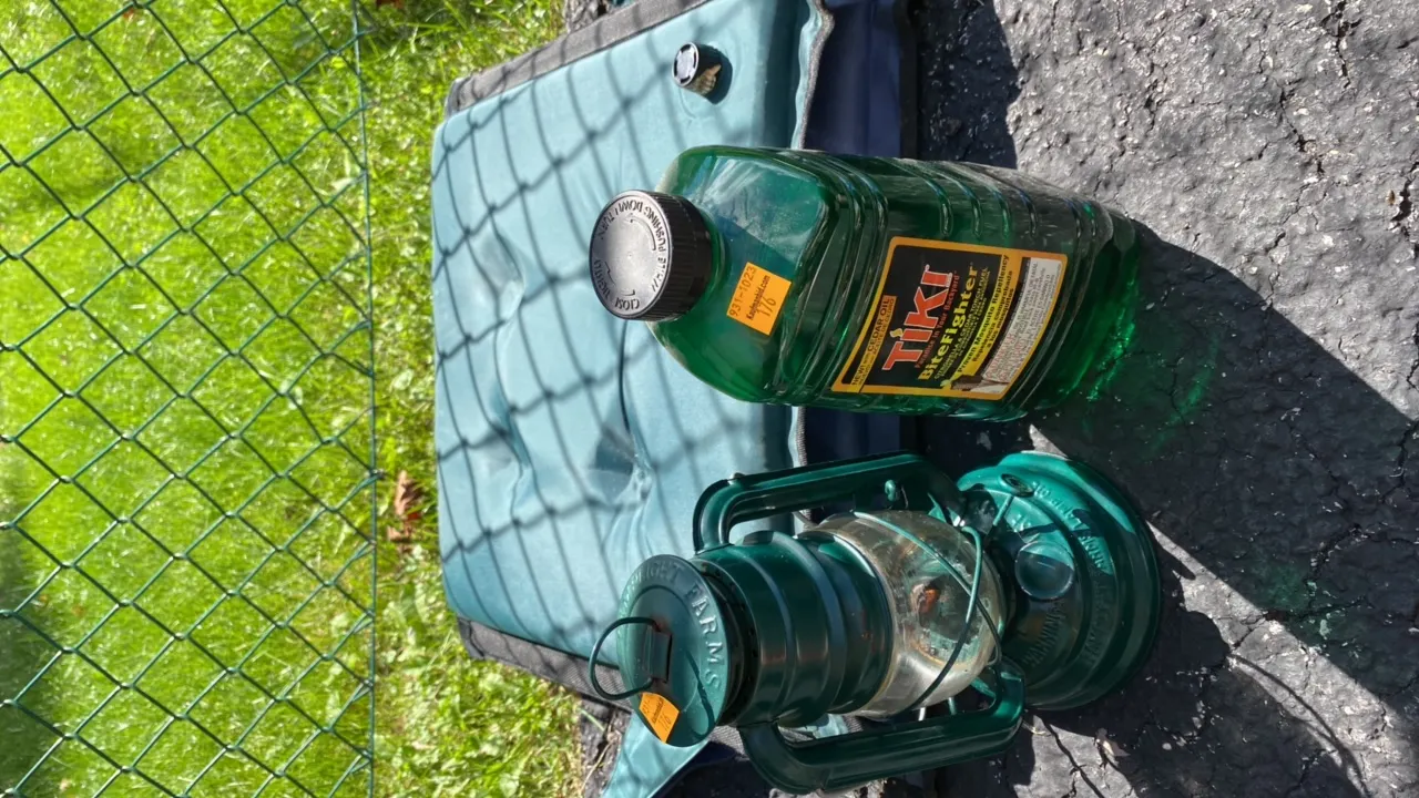 Foldable Inflatable Chair, Green Lantern, Half Full Bottle of Tiki Torch Fuel
