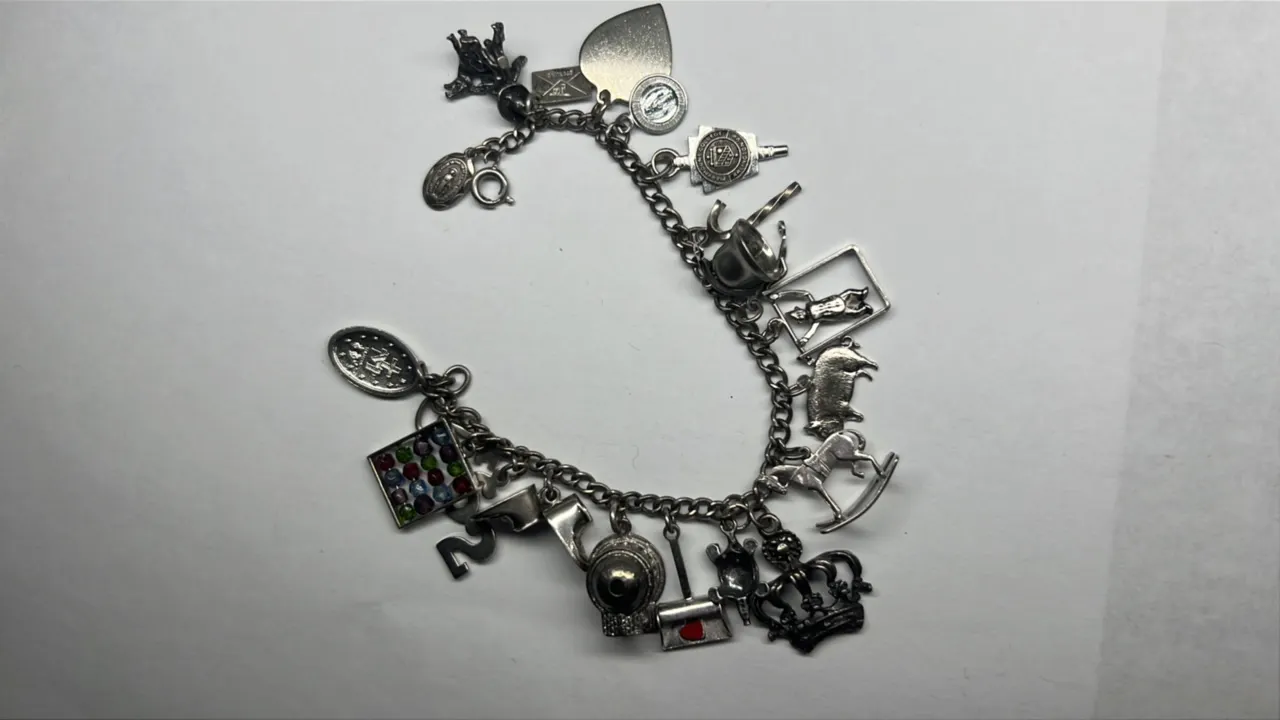Sterling Charm Braclet w/ Sterling Charms, 36.6 Gram