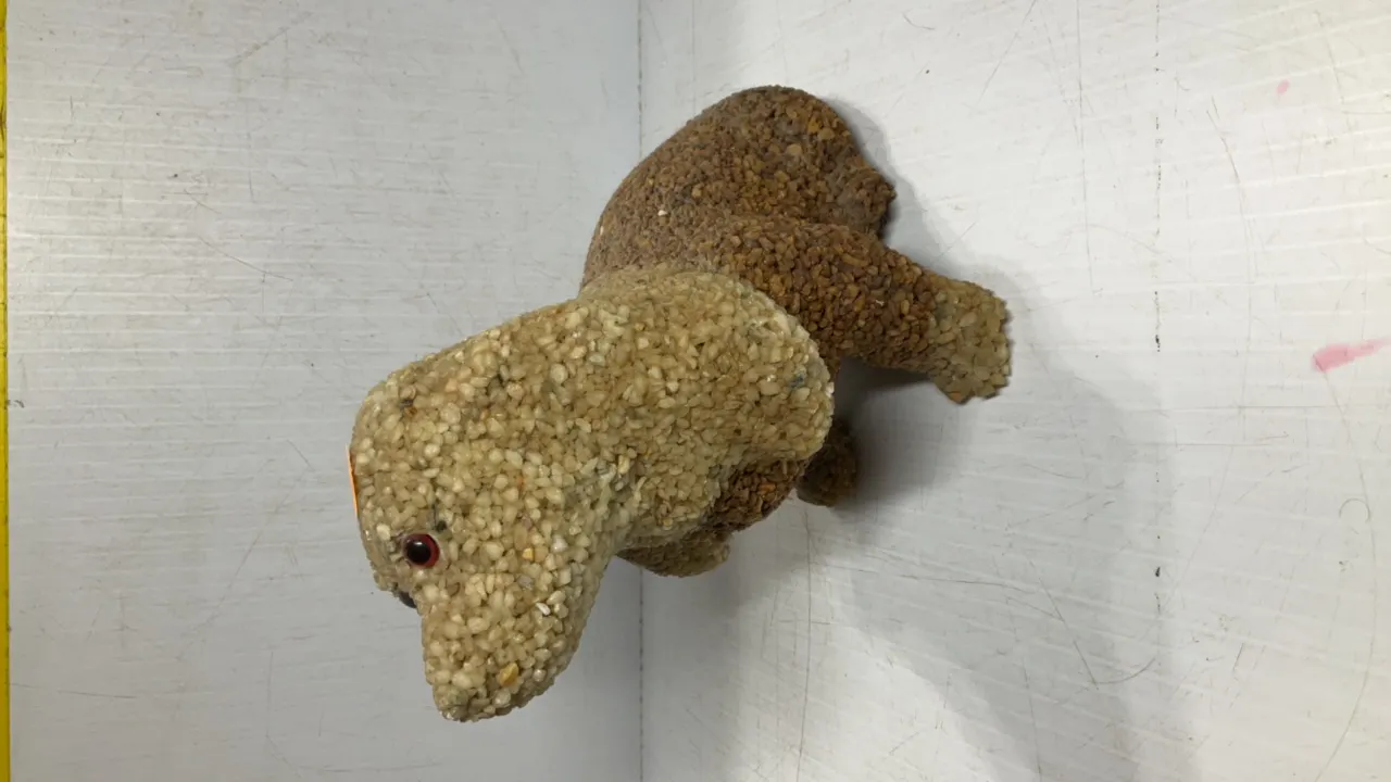Dog Statue Made of Pebbles