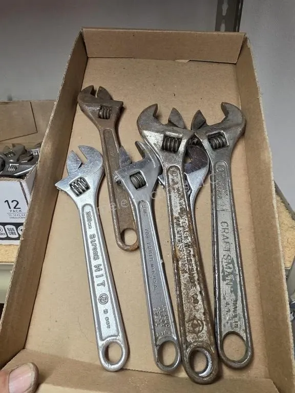 Adjustable wrenches
