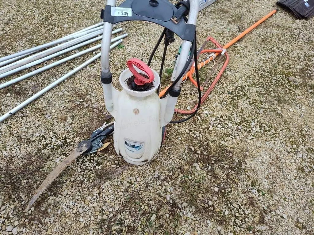 Pole saw, three saws, sprayer, and trash can