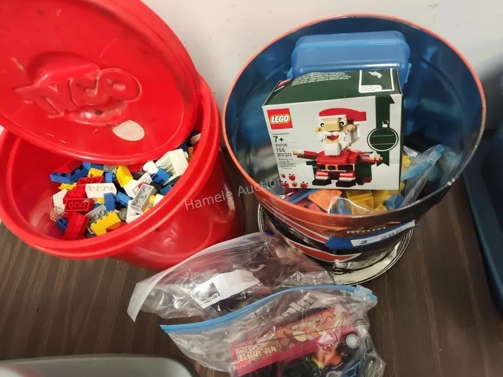 Two containers with blocks and other toys