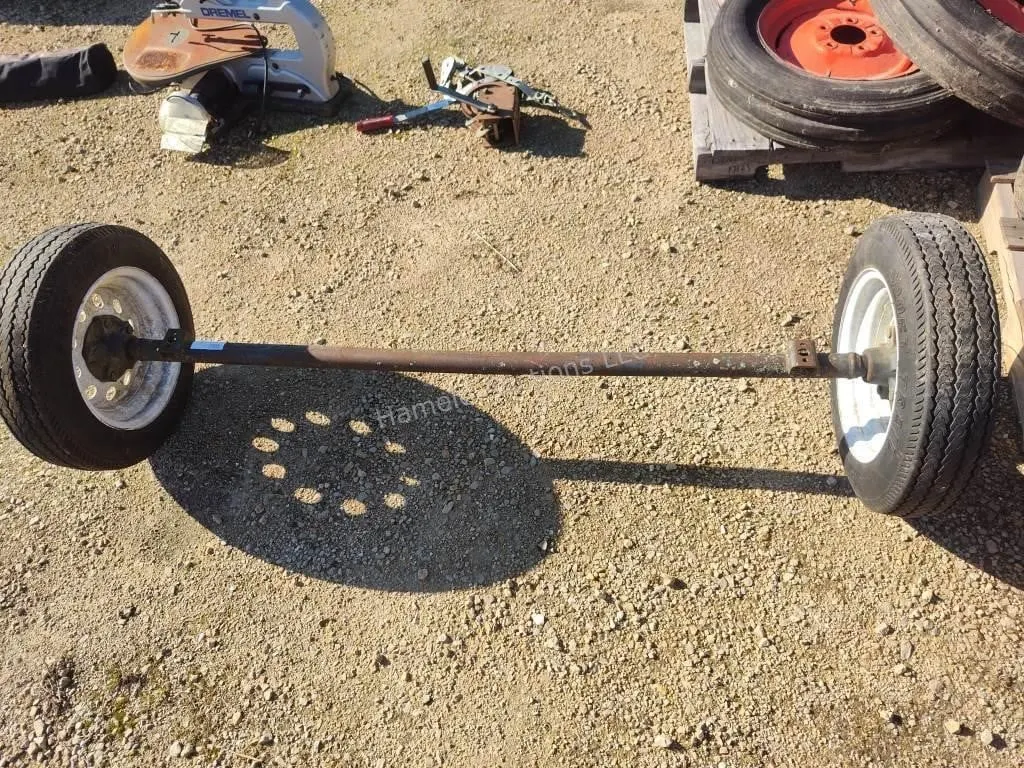 Trailer axle with wheels