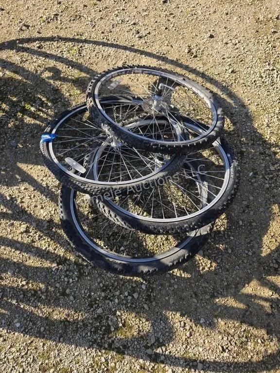 4 bicycle tires and rims