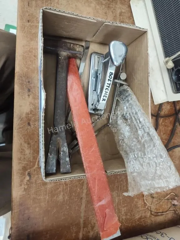 Measuring items, stapler, chocolate co. hammer