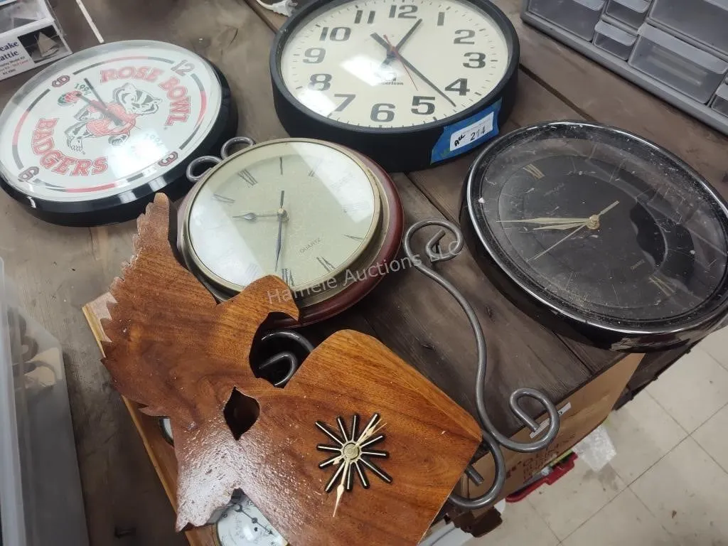 5 clocks and barometer