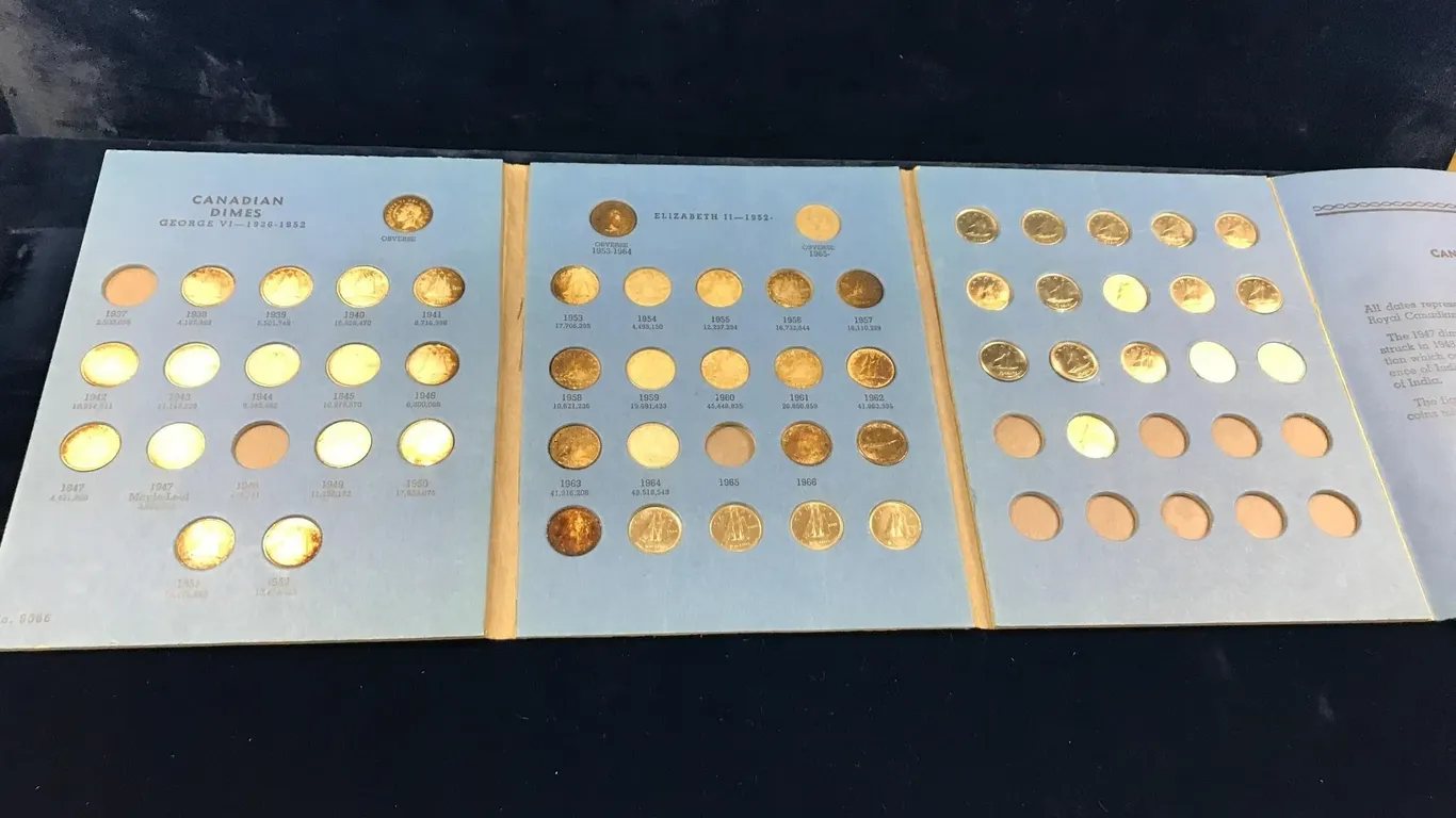 Canadian Dime Book - 33 are silver