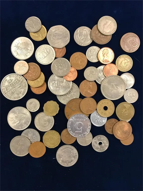 52 Foreign Coins assorted