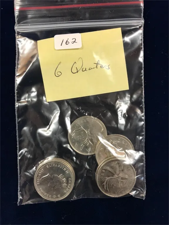 6 Canadian quarters. Assorted. No silver