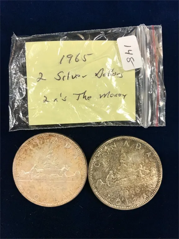2 - 1965 Canadian Silver Dollars