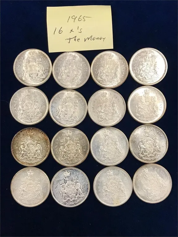sixteen 1965 Can Silver 50 cent pieces