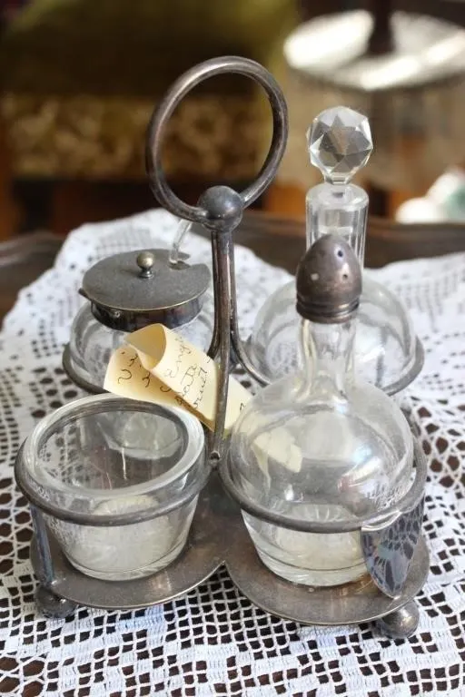 Silver-plate condiment caddy with glass cruets &