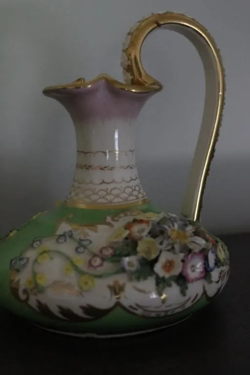 Porcelain Ewer with Applied Floral Decoration
